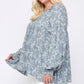 Ditsy Printed And Back Tassel Tie Top With Wrist Smocking Detail